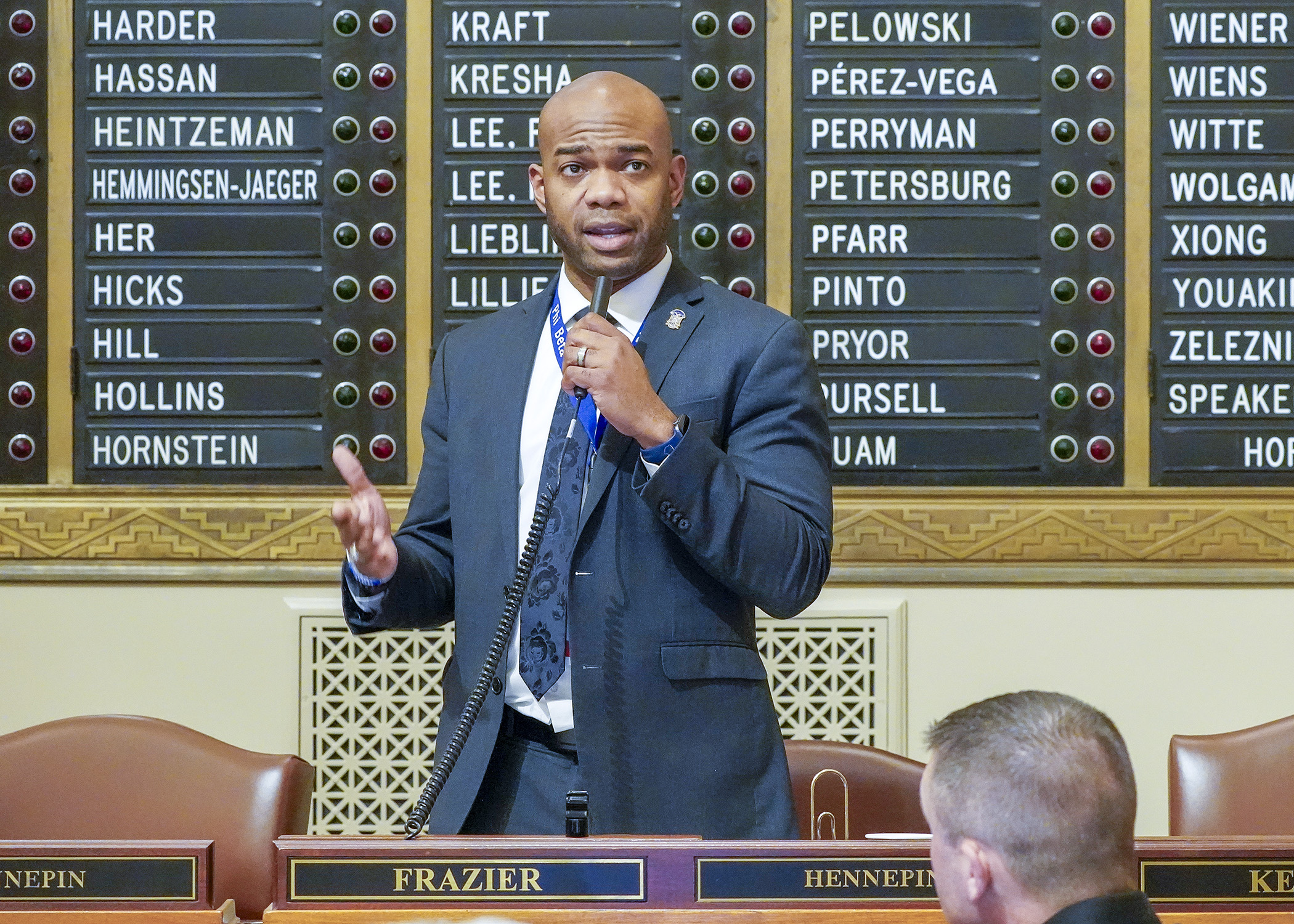 Rep. Cedrick Frazier presents HF3489 on the House Floor March 4. Passed overwhelmingly, it would provide a uniform system across the state for districts that decide to have a school resource officer program. (Photo by Andrew VonBank)